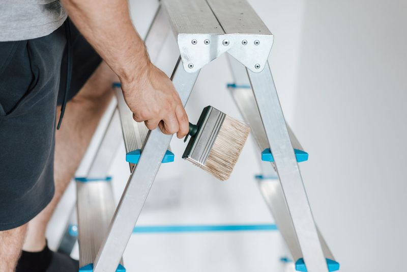 Handyman completing a bathroom faucet repair
